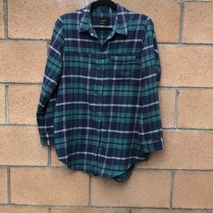 Green plaid flannel with chest patch pocket.